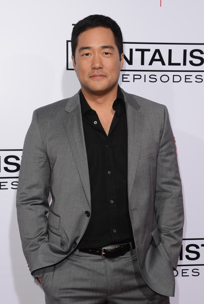 How tall is Tim Kang?